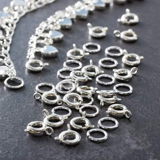 12 Packs: 36 ct. (432 total) 7mm Silver Spring Ring Clasps by Bead Landing™